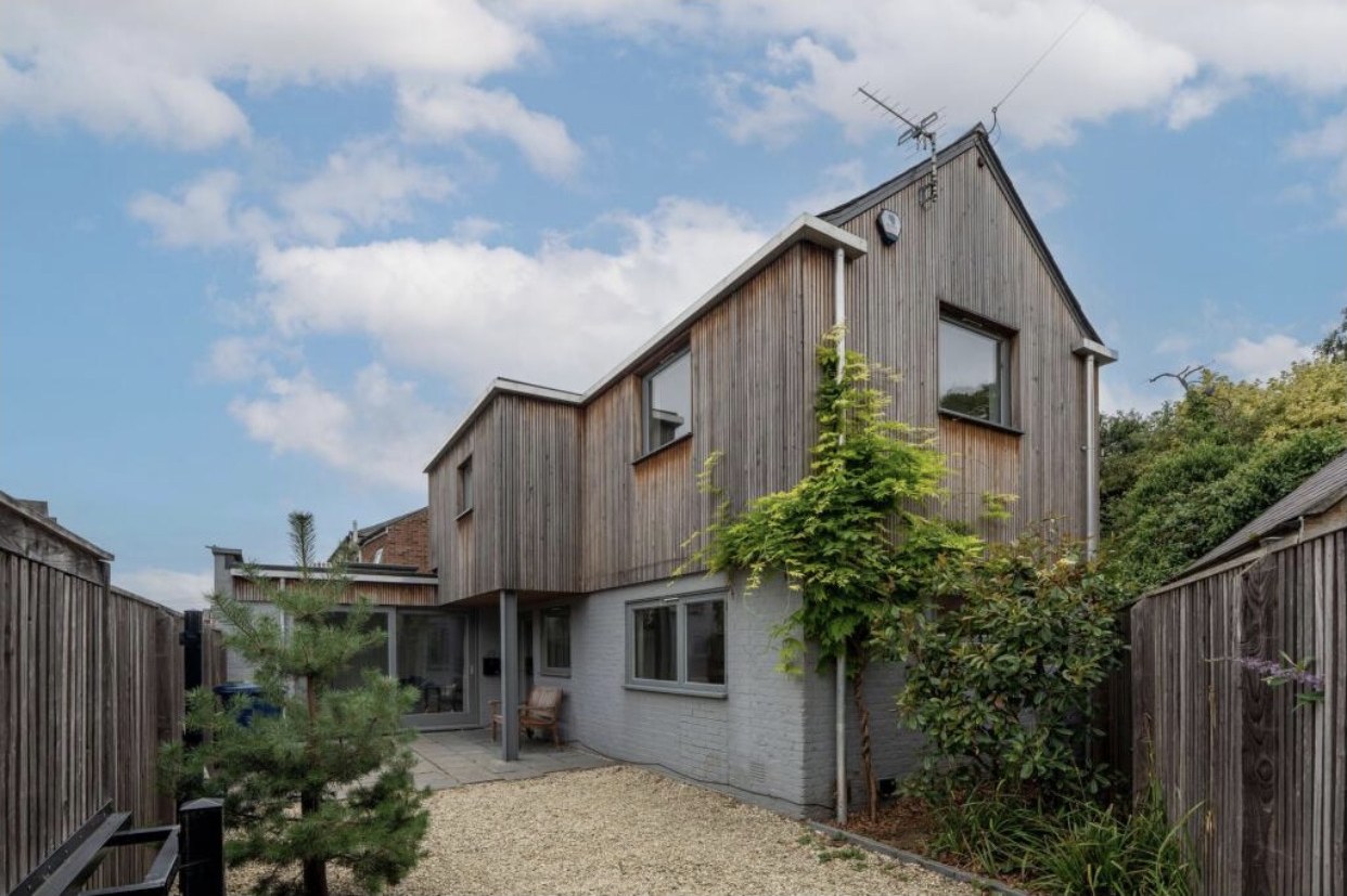 The timber house seen from the garden