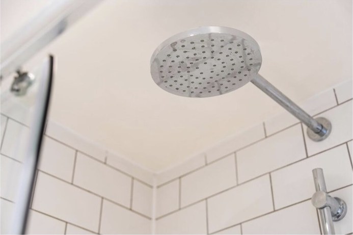 Close-up of the rainfall shower head